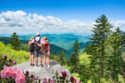 family enjoying beautiful mountain view